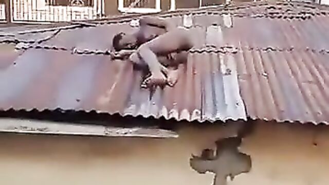 Naked Woman With Small Boobs Caught On Rooftop In Public In Benin City, Nigeria - 5 image