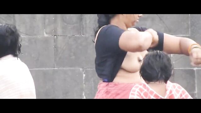 Indian Woman Caught Showing Her Breasts In Public - 1 image
