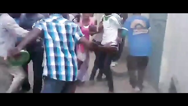 Nigerian Woman With Big Breasts Stripped Naked And Beaten In Public For Allegedly Sending Robbers After Bank Customers - 1 image
