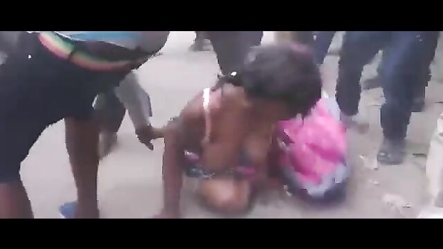 Nigerian Woman With Big Breasts Stripped Naked And Beaten In Public For Allegedly Sending Robbers After Bank Customers - 4 image