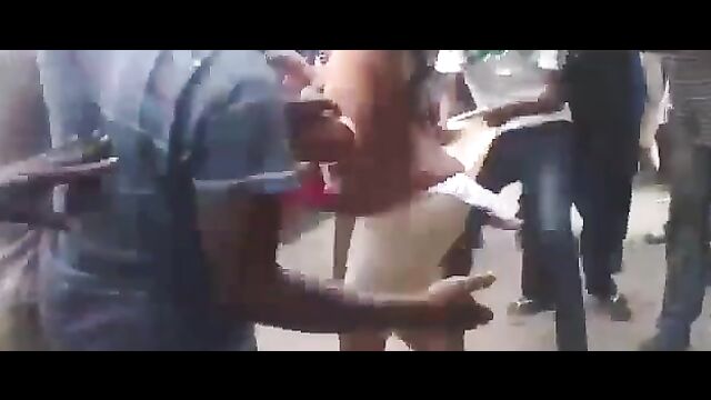 Nigerian Woman With Big Breasts Stripped Naked And Beaten In Public For Allegedly Sending Robbers After Bank Customers - 5 image