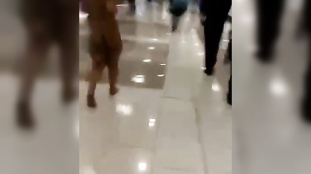 Ebony Woman Strips Naked And Runs Mad In Public In American Airport - 3 image