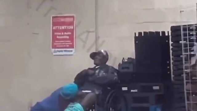 Disabled Guy Receiving Blow Job On A Wheelchair In Public - 3 image