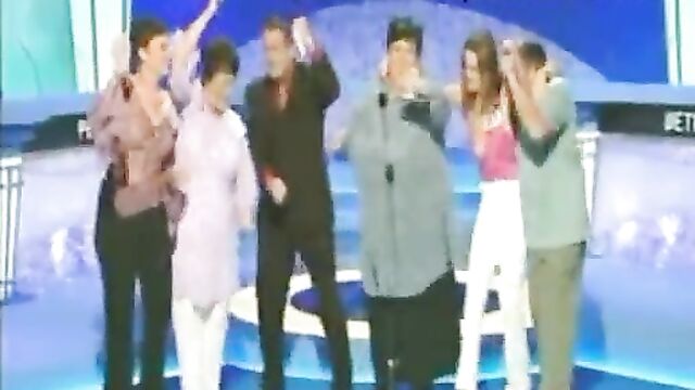 Breasts pop out in public on Live TV game show - 1 image