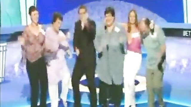 Breasts pop out in public on Live TV game show