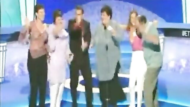 Breasts pop out in public on Live TV game show - 3 image