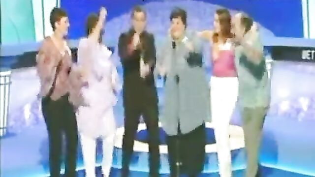 Breasts pop out in public on Live TV game show - 4 image