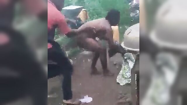 Nigerian Slut Stripped Naked And Beaten In Public Market For Allegedly Wanting To Buy Killer Charm - 2 image