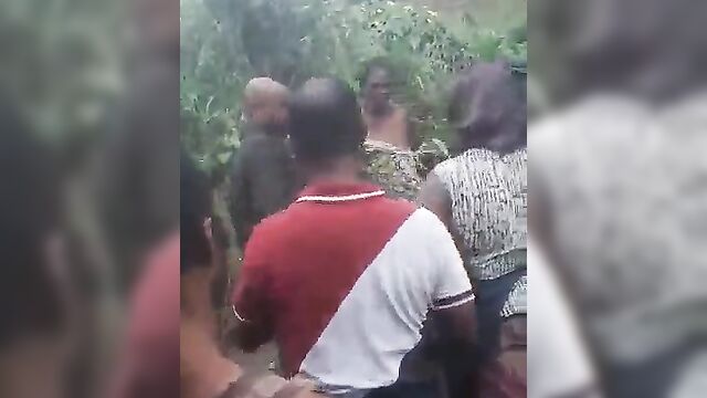 Nigerian Slut Stripped Naked And Beaten In Public Market For Allegedly Wanting To Buy Killer Charm