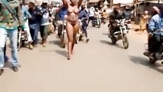 Must Watch: Lady walking around naked on the streets in broad daylight for money ritual!