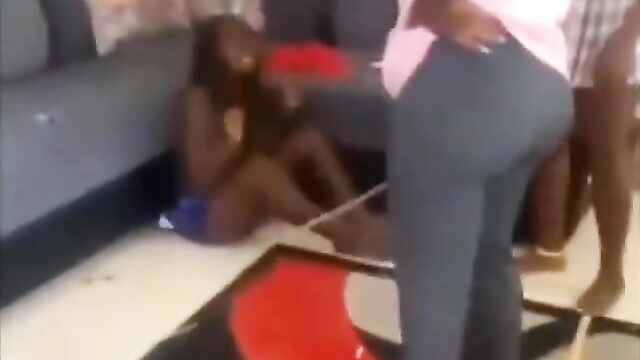 Boobs Exposed As Side Chick Gets Stripped And Beaten With Sticks In Public – Full Video - 5 image