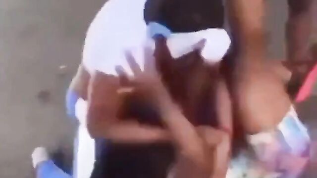 Big breasts fly out in public as 2 black girls fight over white boyfriend