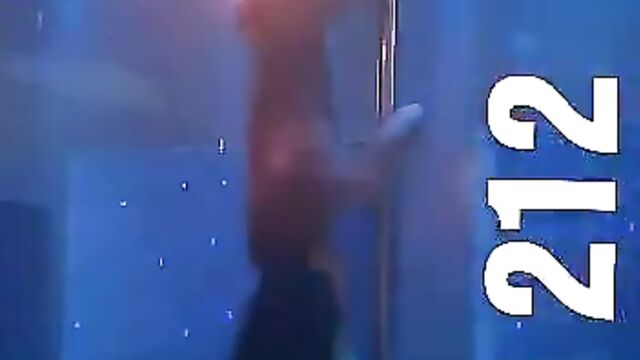 Stripper with big boobs caught doing it on a pole in public