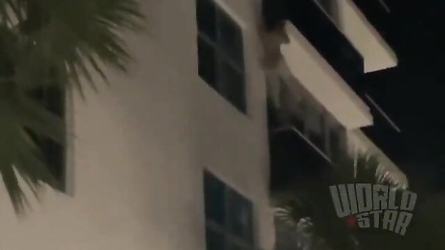 Side chick climbs down 5 storey building NAKED after angry woman caught her with her cheating husband!