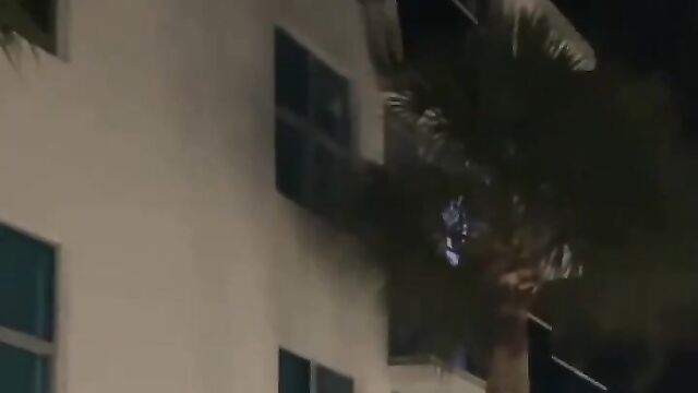 Side chick climbs down 5 storey building NAKED after angry woman caught her with her cheating husband! - 3 image