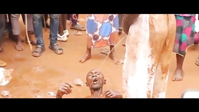 2 men accused of witchcraft stripped naked and forced to pee in each other’s mouth in public – Part 1 - 1 image