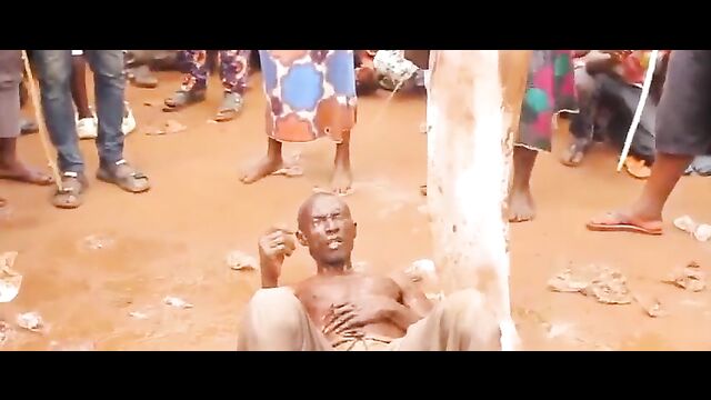 2 men accused of witchcraft stripped naked and forced to pee in each other’s mouth in public – Part 1 - 4 image