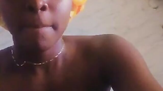 Amateur girl showing her breasts for Yahoo Boy she met on Facebook - 1 image