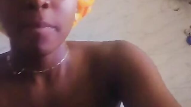 Amateur girl showing her breasts for Yahoo Boy she met on Facebook - 2 image