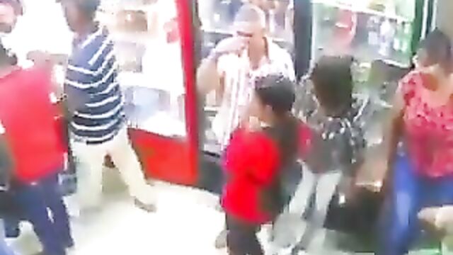 Girlfriend beats up side chick in public for grabbing her man’s balls in front of her! - 1 image