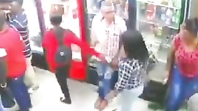 Girlfriend beats up side chick in public for grabbing her man’s balls in front of her!