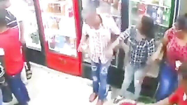 Girlfriend beats up side chick in public for grabbing her man’s balls in front of her! - 5 image