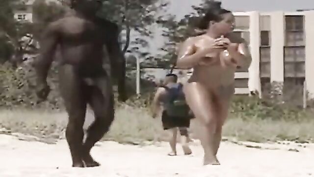 Crazy naked couple with big boobs and big dick caught on the beach in public - 1 image