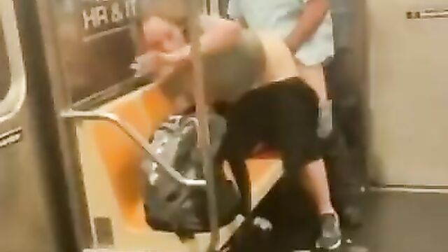 Crazy elderly couple caught having fun on a train