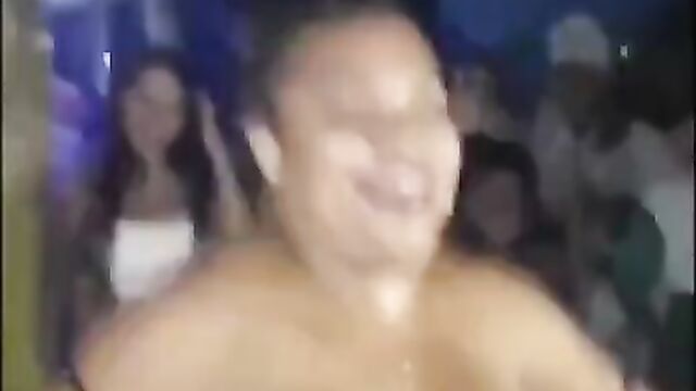 Big breasts out, as woman vibes in the club