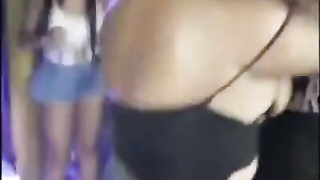 Big breasts out, as woman vibes in the club - 4 image