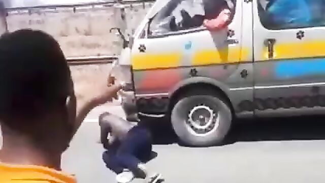 Half naked woman with big breasts protesting in public on the road in South Africa - 4 image