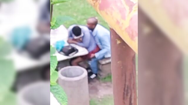Ebony couple banging in a public park - 1 image