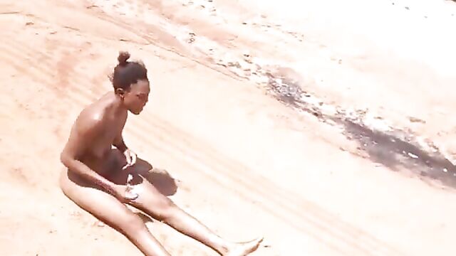 Ghanaian lady strips naked in public and curses her boyfriend for dumping her for another girl - 1 image