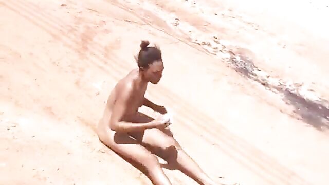 Ghanaian lady strips naked in public and curses her boyfriend for dumping her for another girl