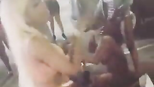 Boobs out as chicks fight over a sugar daddy’s money in public