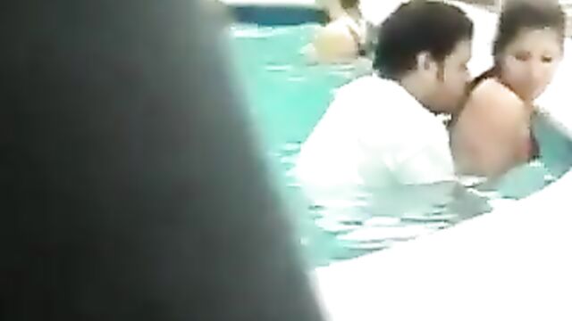 Crazy couple caught having sex in a pool - 1 image