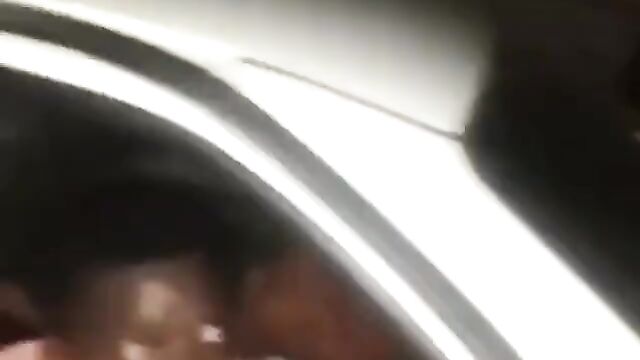 Couple caught having sex in a car at night - 1 image