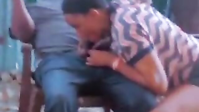 Thot giving blow job in a public restaurant - 1 image