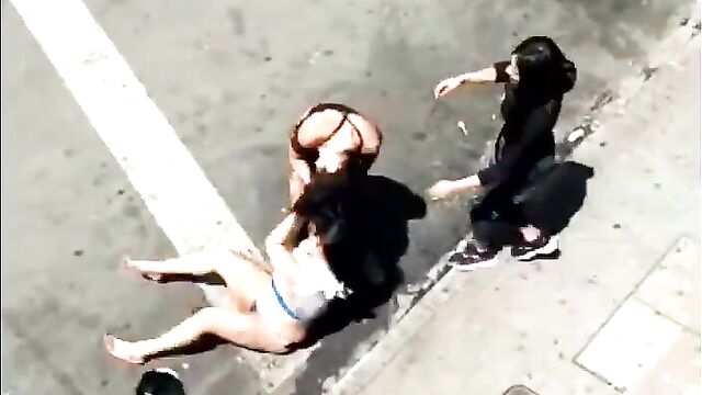 Thots fighting on the road in their underwear - 4 image