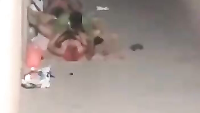 Horny men having sex with prostitutes in a shoddy place