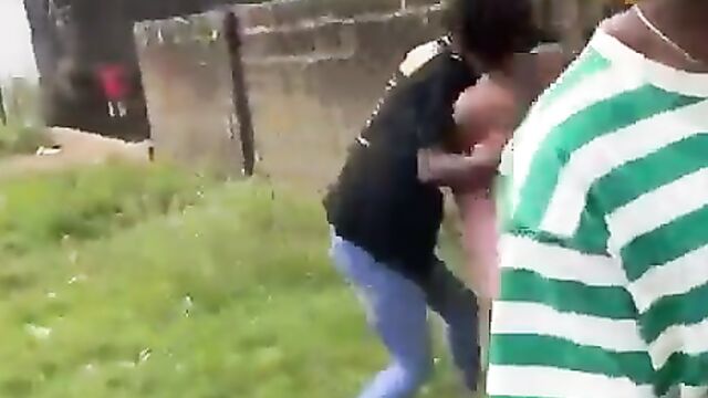 Breasts exposed as 2 big girls fight over sugar daddy - 1 image