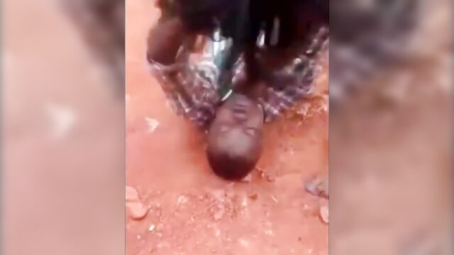 Angry wife beats husband in street fight - 1 image