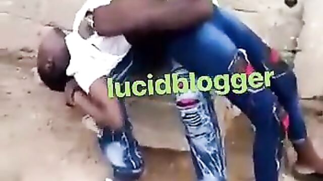Nigerian Man Caught Sucking Girlfriend’s Breasts In Public - 1 image