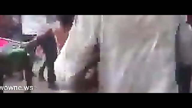 Busty Nigerian woman stripped naked and beaten in public after being allegedly falsely accused of witchcraft and killing her children - 4 image