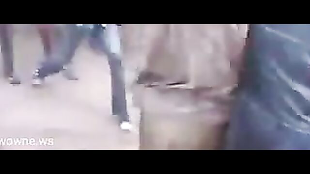 Busty Nigerian woman stripped naked and beaten in public after being allegedly falsely accused of witchcraft and killing her children - 5 image