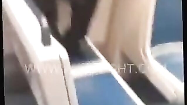 Chick gets stripped naked, exposing boobs and ass while fighting on a train - 1 image