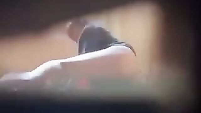 Yahoo Boy films couple having sex through the keyhole - 1 image