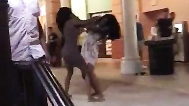 2 girls fighting and showing ass in public - 1 image