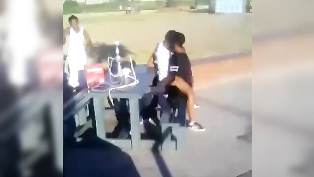 Ebony couple caught having sex on a chair in public