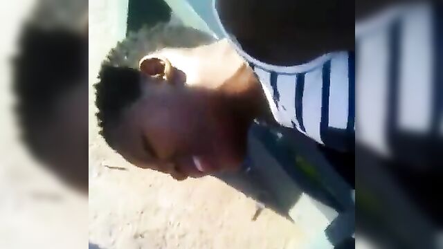 Ebony couple caught having sex on a chair in public - 4 image